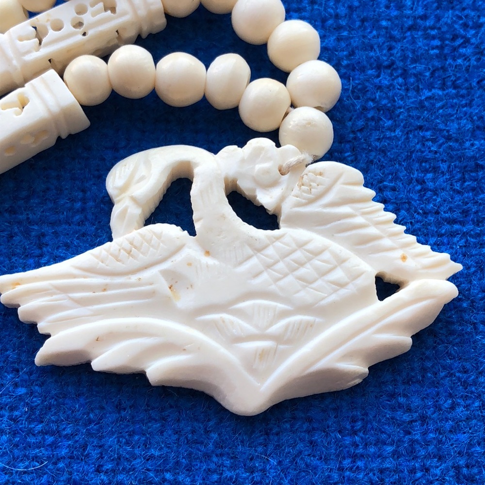 Vintage hand carved bone swan necklace